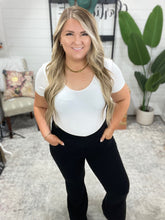 Load image into Gallery viewer, Building Habits Twill Flared Crossover Waist Pant in Black