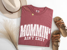 Load image into Gallery viewer, Mommin&#39; Ain&#39;t Easy Graphic Tee