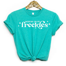 Load image into Gallery viewer, PREORDER: Working on My Freckles Graphic Tee