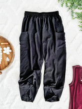 Load image into Gallery viewer, Cropped Tulip Hem Dressy Cargo Pants In Jet Black