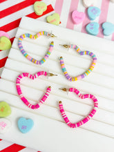 Load image into Gallery viewer, PREORDER: Rubber Disc Open Heart Hoop Earrings in Two Colors